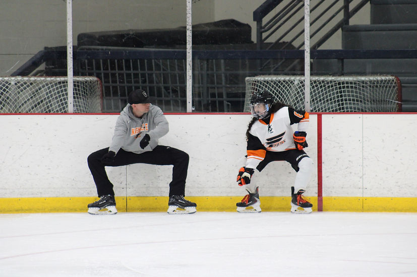 Yuriy Kocherzhenko conducting a skate lesson