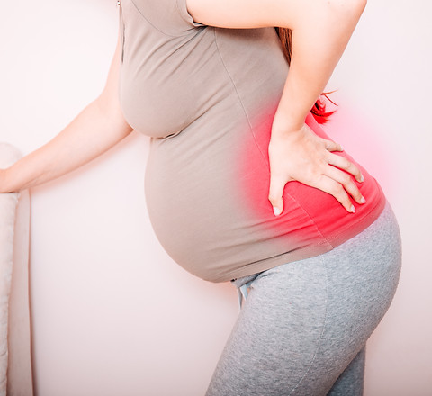 Cropped view of young pregnant woman mas