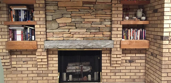 stone and brick fireplace
