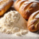 flour on a worktop sprinkled, with freshly baked bread.jpg
