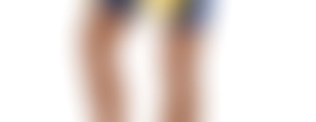 slim woman in blue and yellow bajan shorts