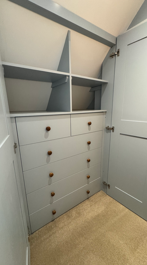 Bespoke wardrobe drawers with smooth soft-close runners.