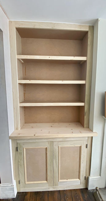 Made -to-measure alcove units designed to fit existing features.