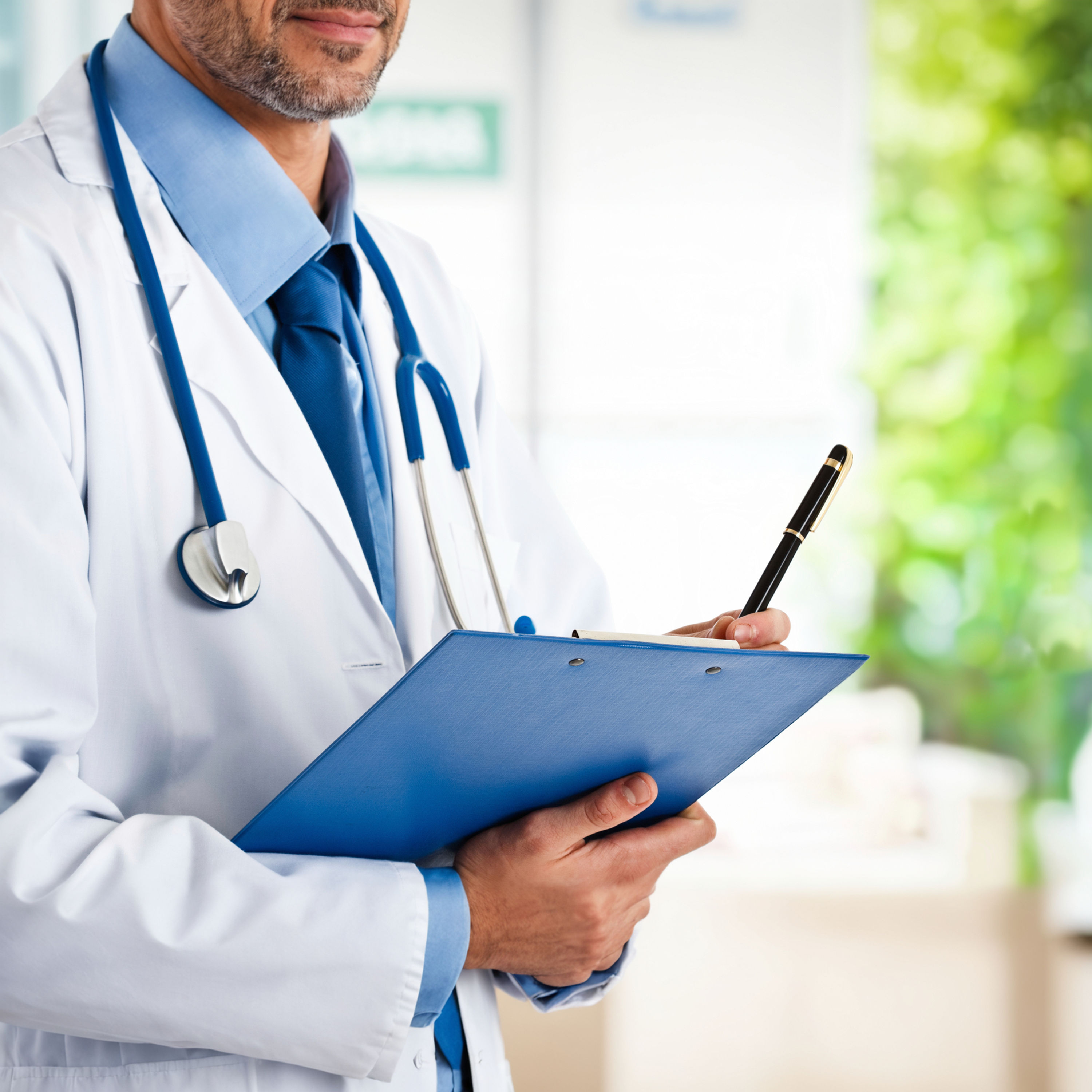 Doctor holding clipboard