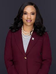 Dr. Karrie G. Dixon is the 13th president of North Carolina Central University. She has over 15 years of leadership experience in the UNC system. She has multiple honors such as William C. Friday Lifetime Achievement Award and the Presidential Lifetime Achievement Award. She has received bachelor's degree from North Carolina State University, a master's degree from the University of North Carolina at Greensboro, and a doctorate from North Carolina State University.