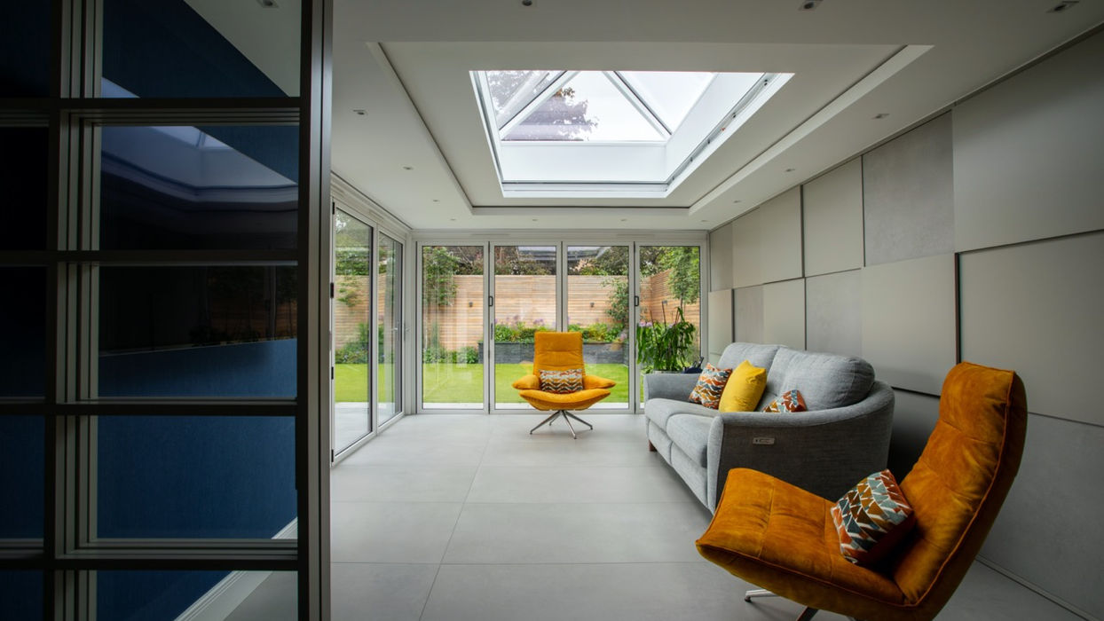 modern grey room with orange sofa