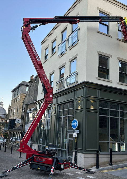 commercial window cleaning on a cherry picker