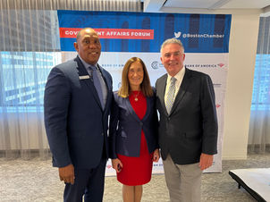Treasurer Goldberg standing between James Rooney, President of the Greater Boston Chamber of Commerce, and Maurice Coleman, SVP of Bank of America.