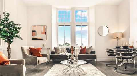 Open plan lounge dining area, brown velvet sofa and matching dining set, taupe armchairs, solid white marble coffee table, and rust coloured accents.