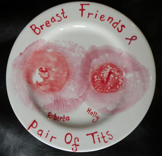 Boob prints on a plate, there is the wording 'Breast friends and pair of tits' around the rim of the plate.