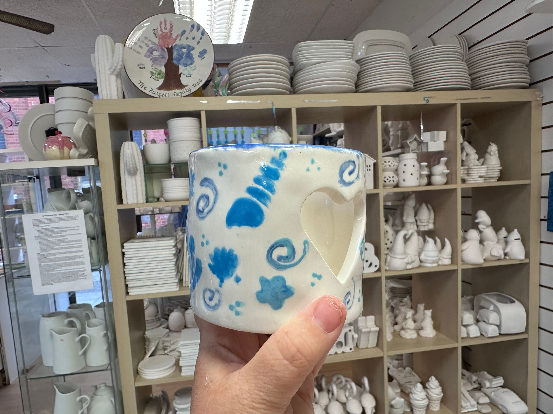 tea light holder painted with a sea shell theme