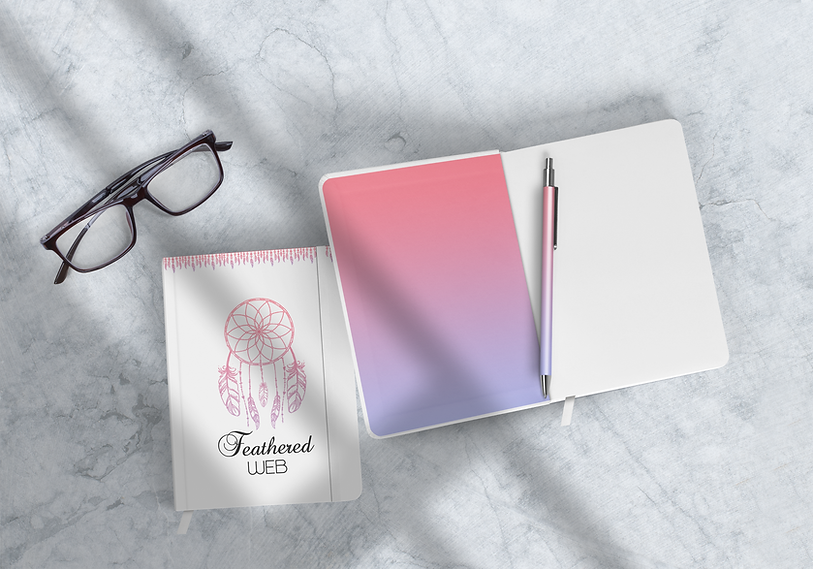Notebook mockup feathered.png