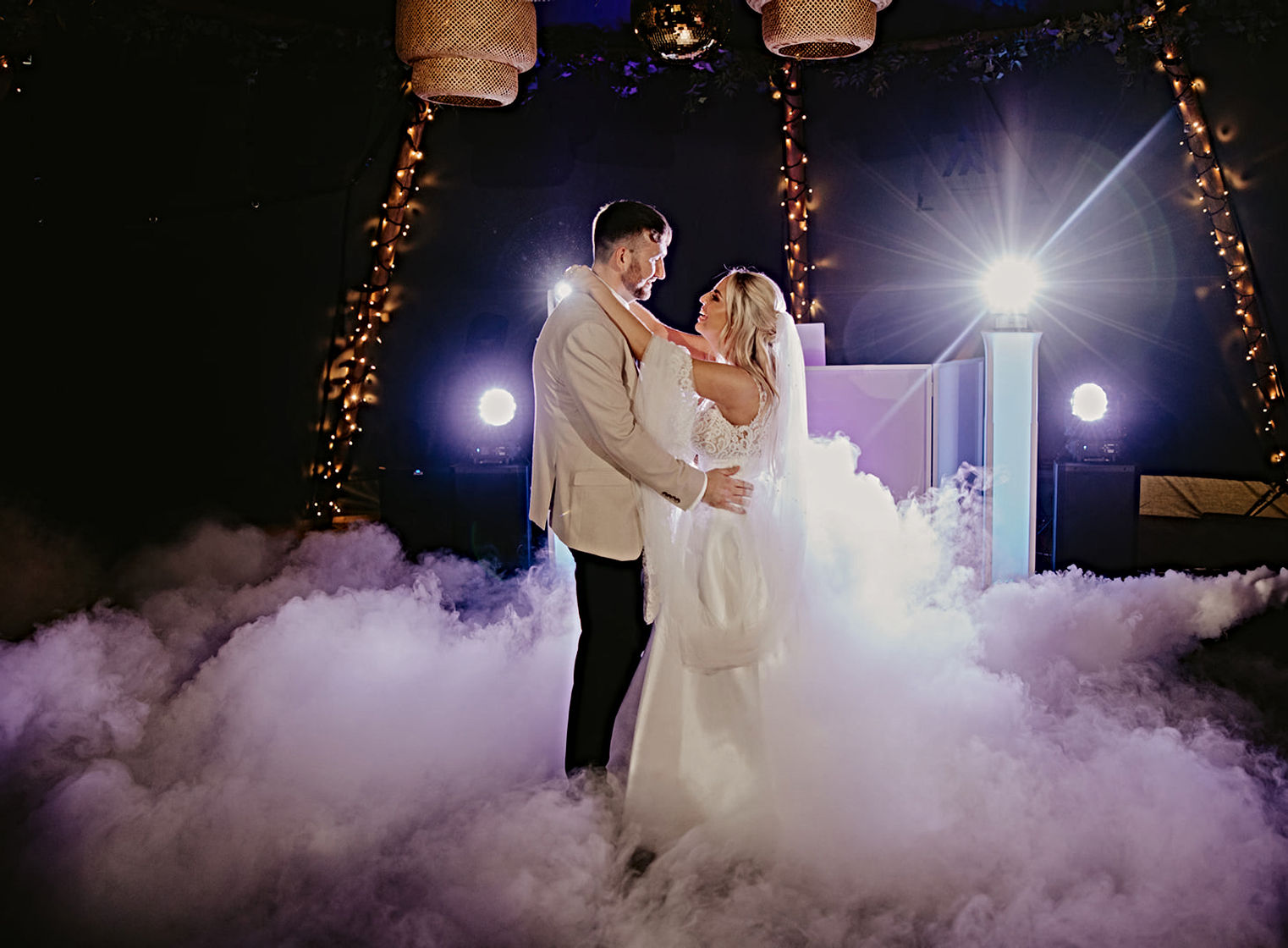 Dry ice dancing on clouds at Woodhill Hall wedding first dance clouds