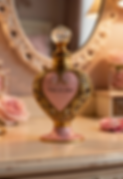 Ornate pink and gold heart perfume bottle, 'Chaleur d'amour'
