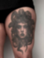Black and gray portrait tattoo by professional tattoo artist in Katy, TX
