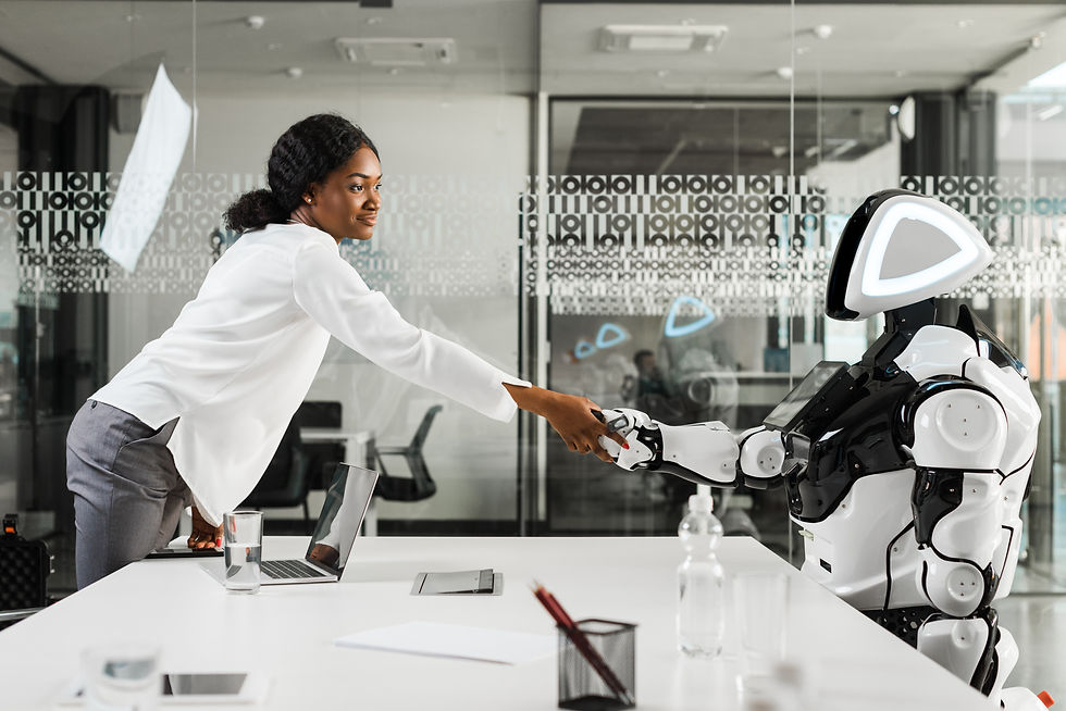 smiling african american businesswoman shaking hands with robot in office.jpg