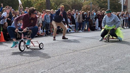 teacher tricycle race school event