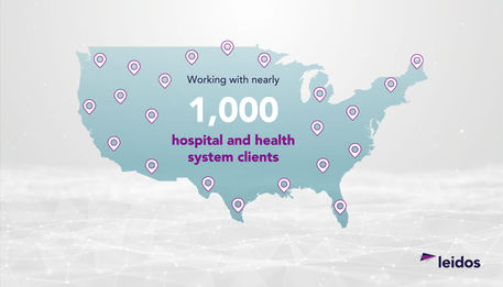 Static image from tradeshow video showing teal-colored map of the United States with purple location pins scattered across various states. Large white text reads '1,000' with purple text below stating 'hospital and health system clients.' Leidos company logo appears in bottom right corner.