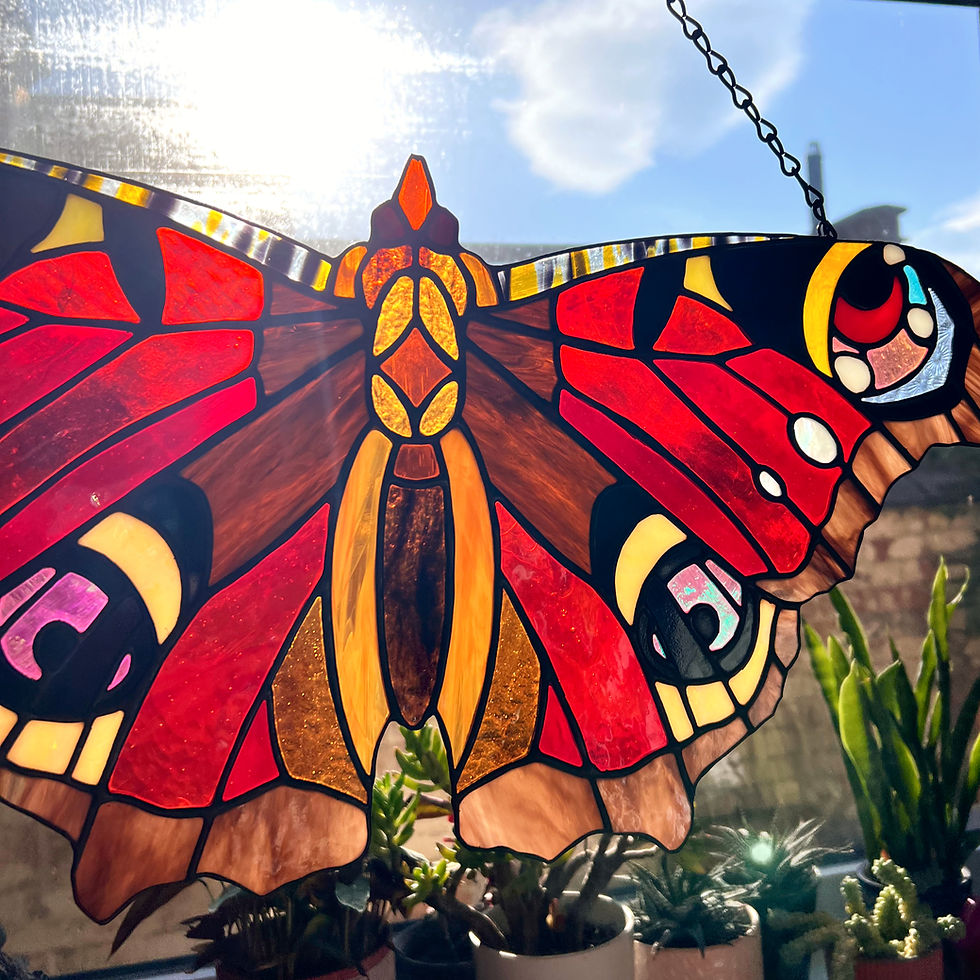 Thumbnail: Striking Peacock Butterfly in stained glass