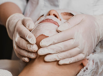 young-beautiful-woman-getting-skin-mask-treatment.jpg