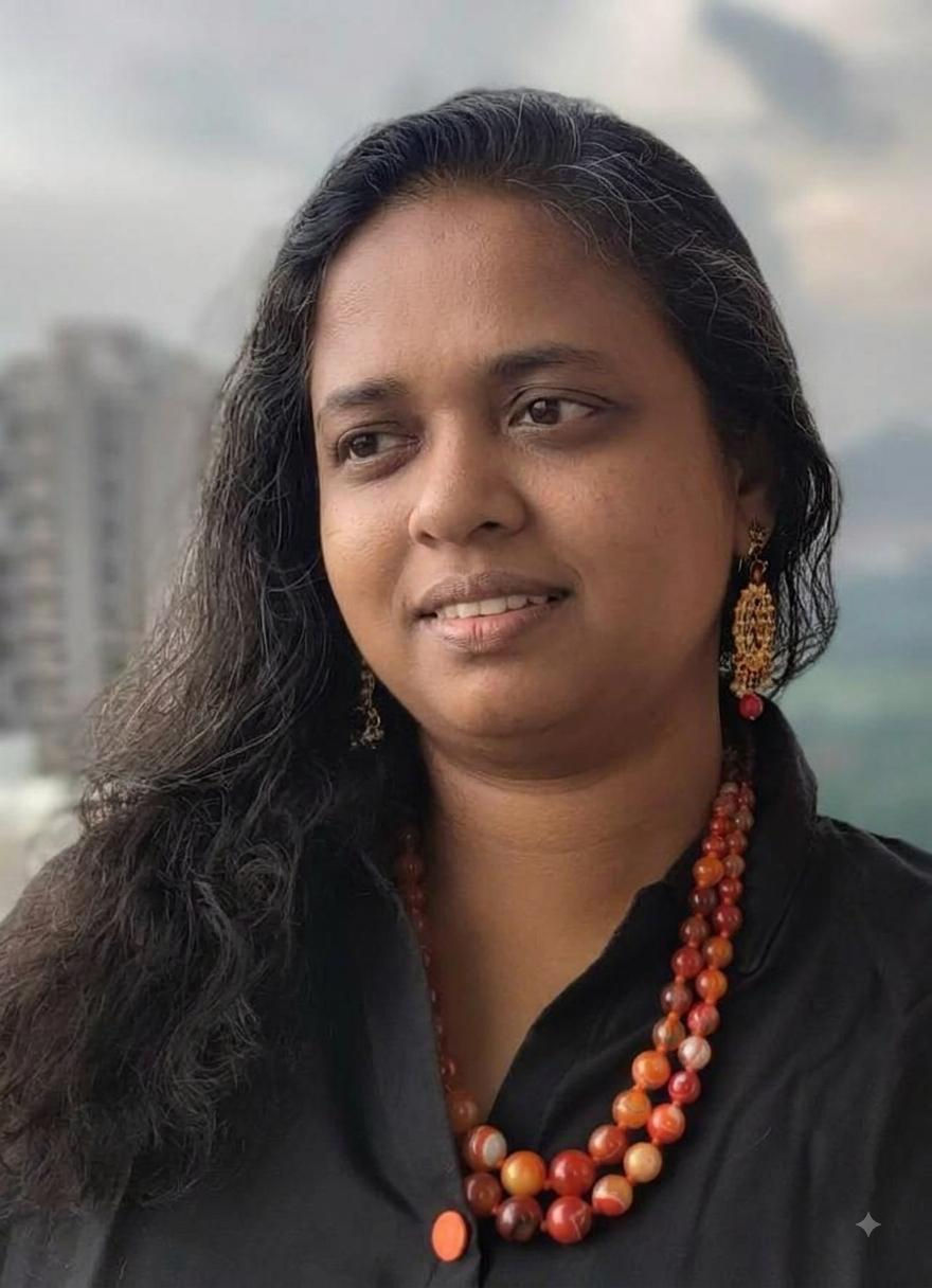 Anitha Manickam smiling