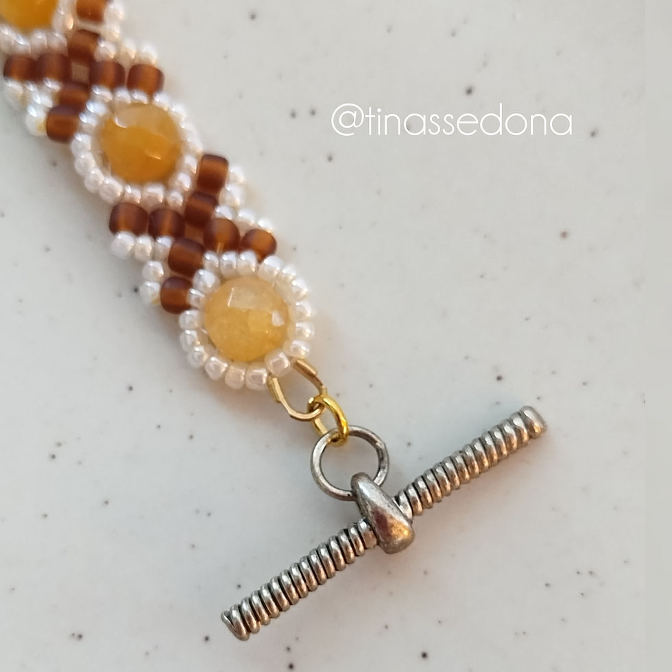 Thumbnail: Hand woven bracelet of framed yellow opal beads