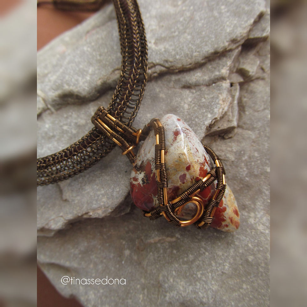 Handwoven necklace of polished jasper on leather