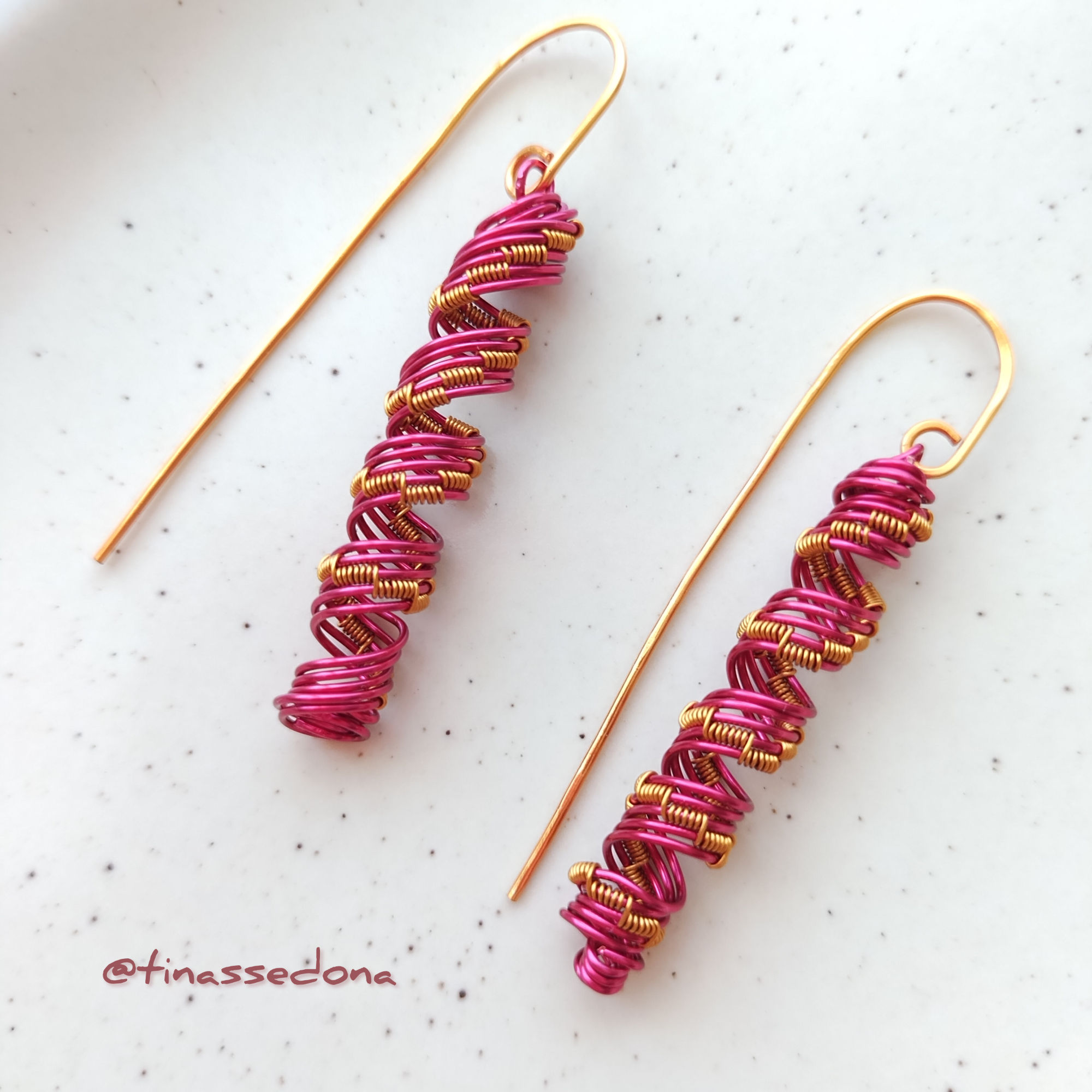 Hand woven cylindrical magenta and bronze wire earrings 2 in