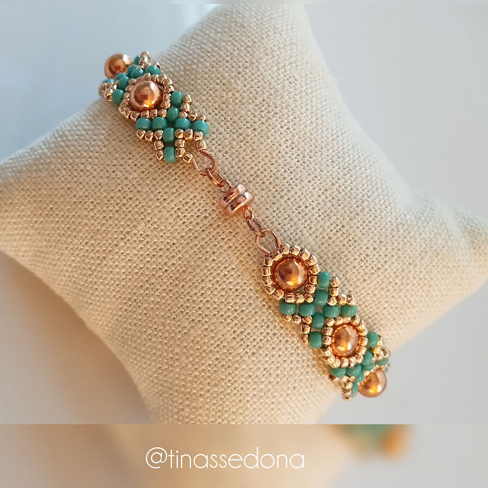 Thumbnail: Hand woven bracelet of turquoise and copper glass beads