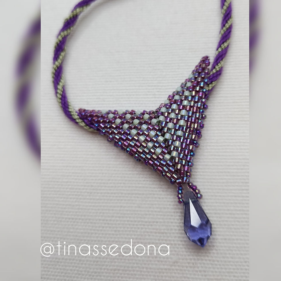 Hand braided Kumihimo necklace with woven purple glass pendant