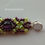 Thumbnail: Hand woven bracelet of grape and peridot glass