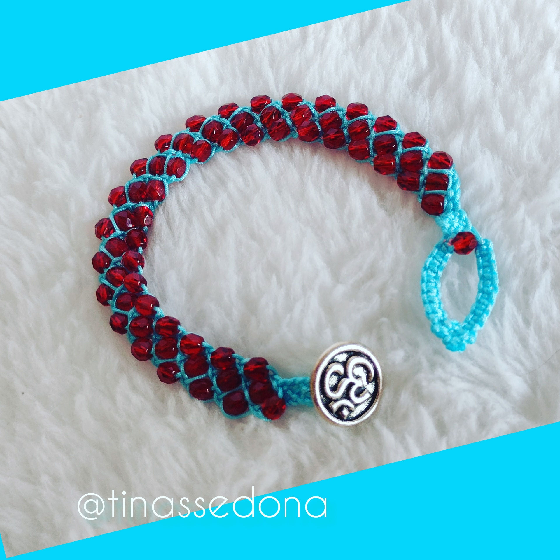Hand woven bracelet of ruby red glass