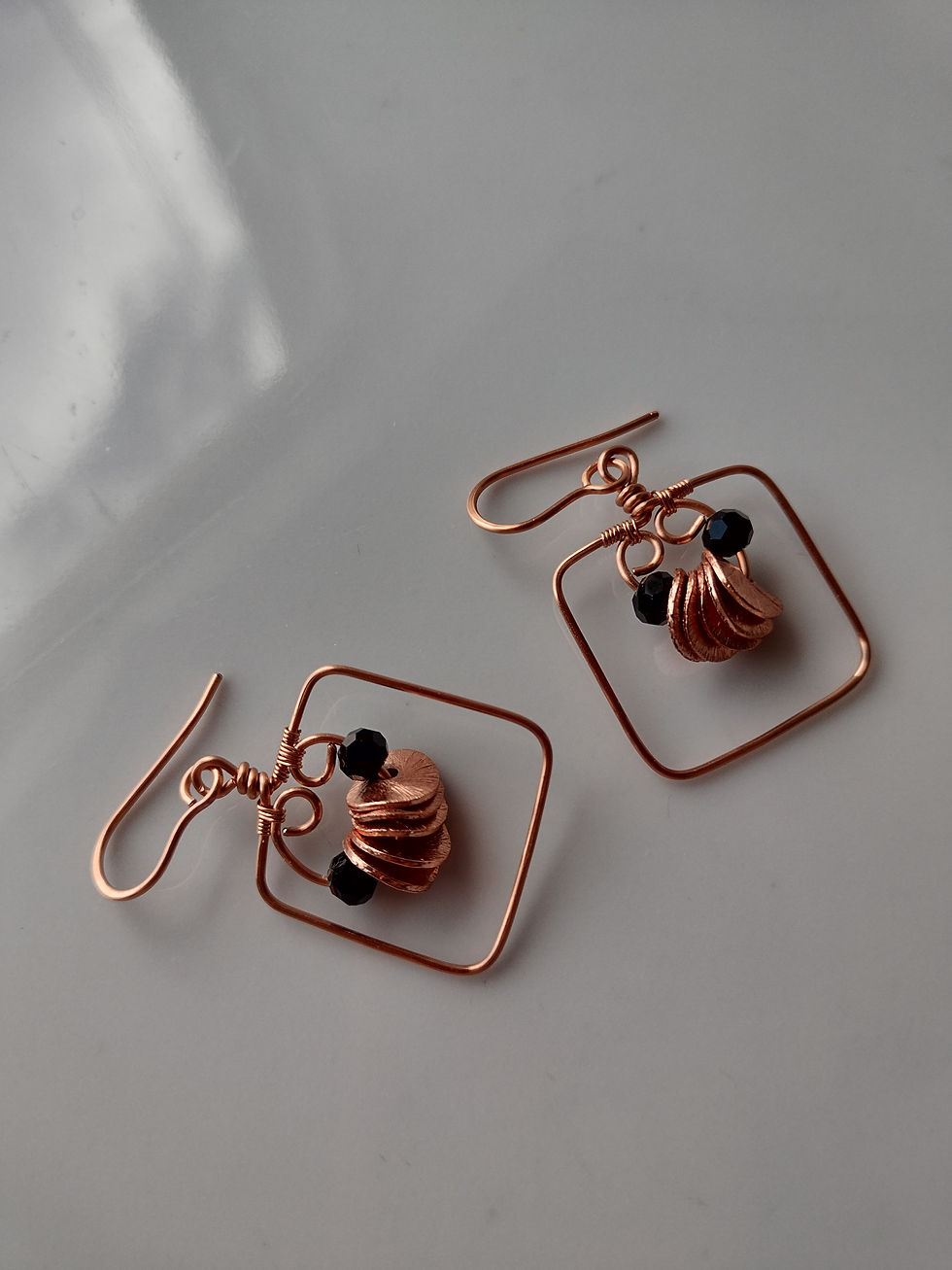 Thumbnail: HanHandmade square earrings of black and copper petal beadsdmade square earrings of black and copper petal beads