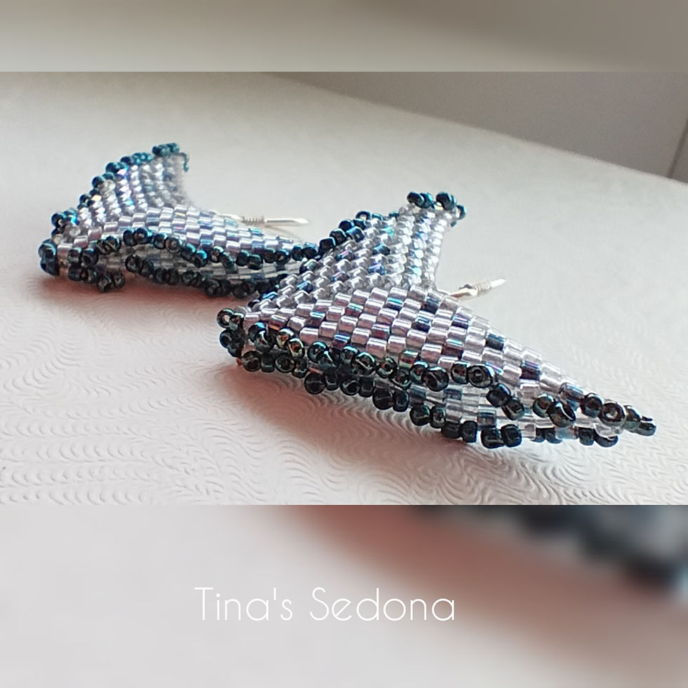 Thumbnail: Hand woven light blue flaired glass geometric earrings