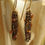 Thumbnail: Handmade vintage bronze knitted earrings with amber crystals
