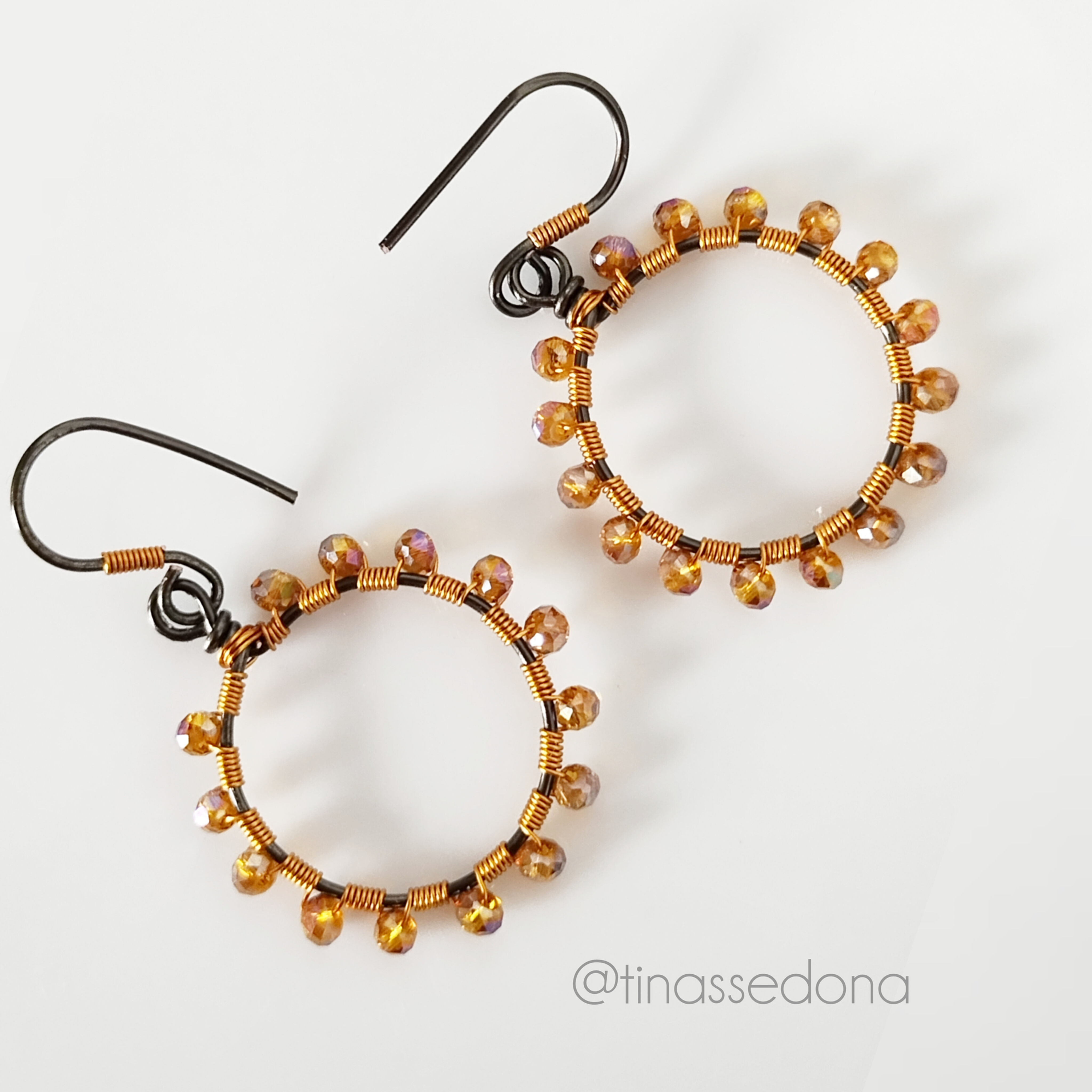 Handmade wirewrapped hoop earrings of hematite wire and amber crystals 1-1/2 in