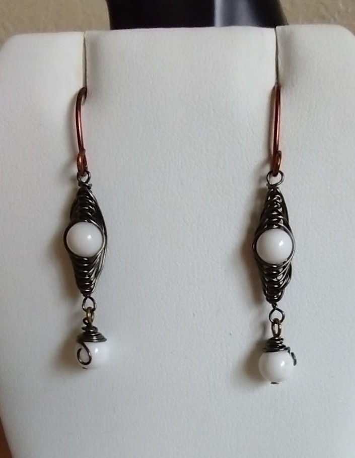 Handmade earrings of hematite and white quartz