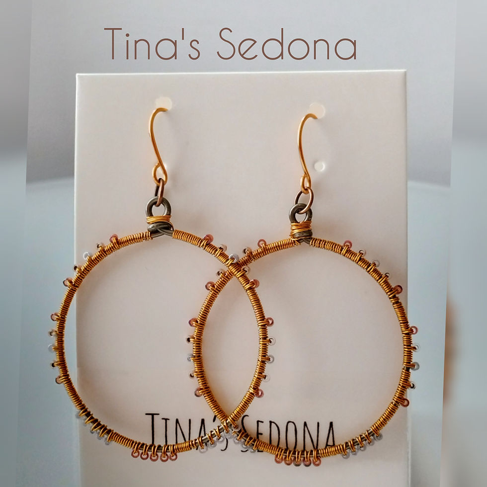 Hand woven jewel tone glass on hematite hoop earrings