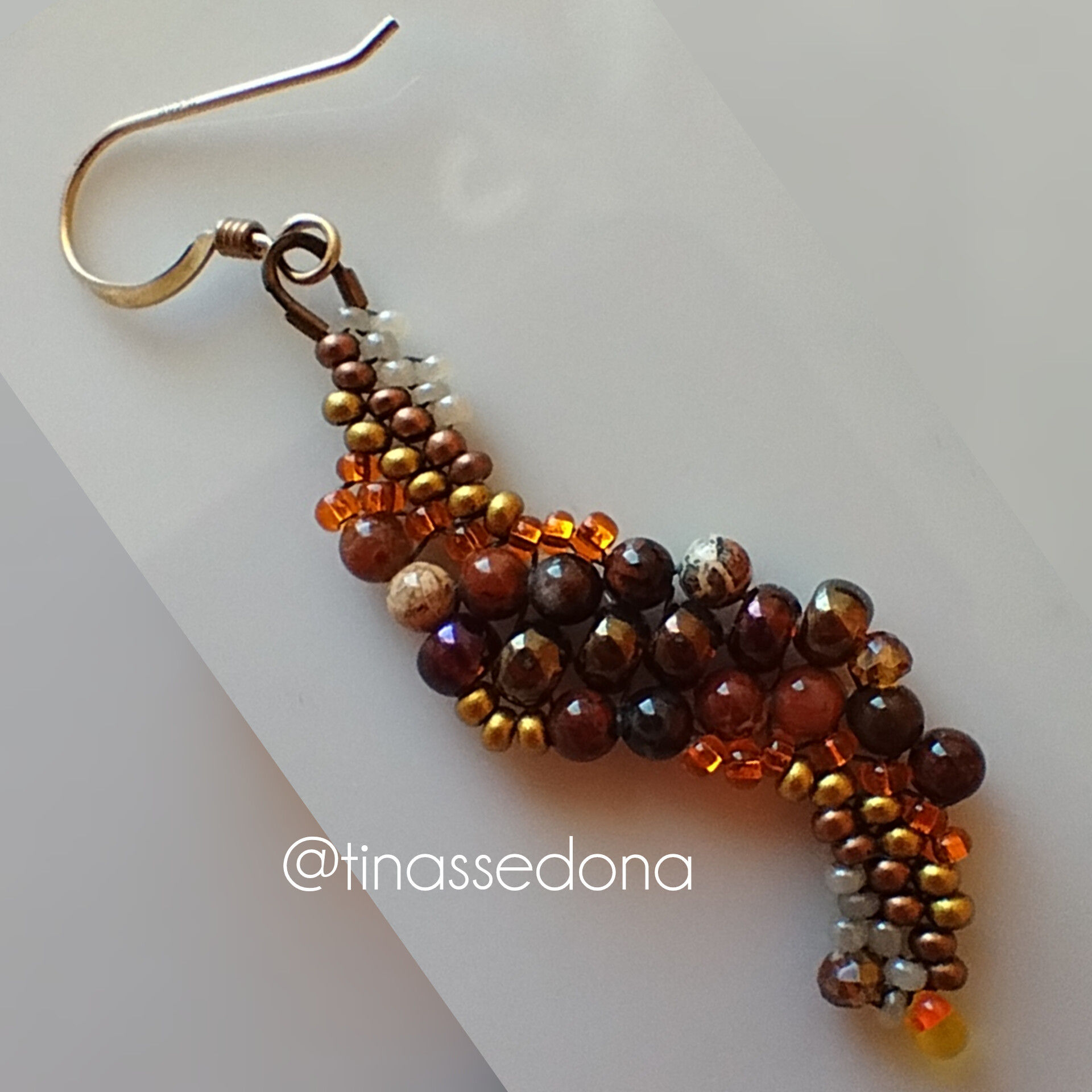 Hand woven earrings of jasper glass and crystal