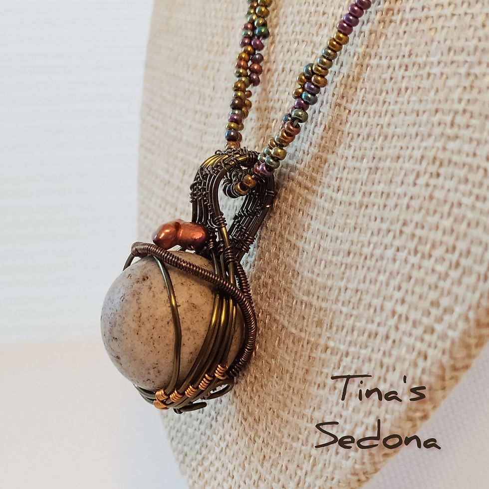 Necklace of wire wrapped vintage clay marble with a freshwater pearl 23-1/4 in
