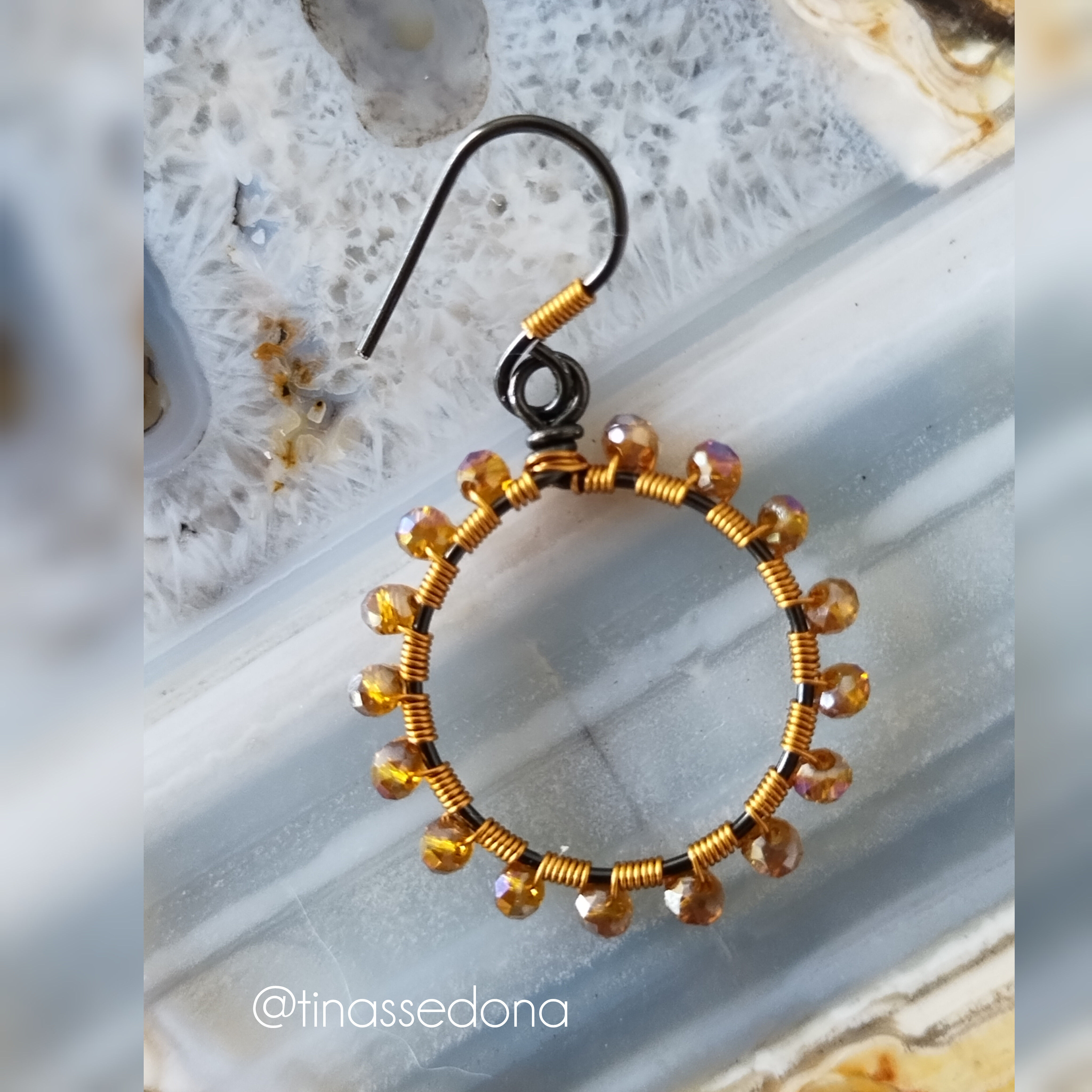 Handmade wirewrapped hoop earrings of hematite wire and amber crystals