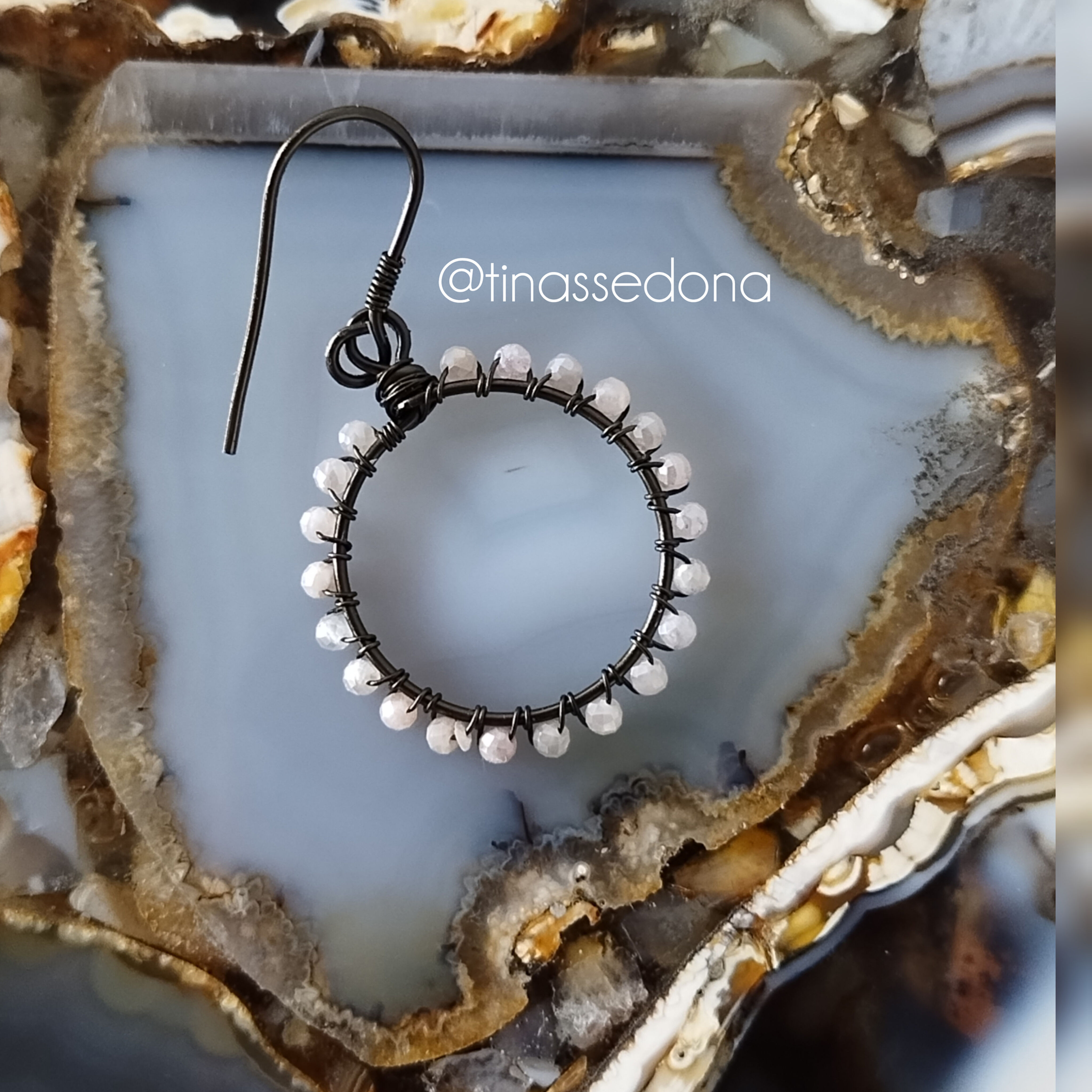 Handmade wirewrapped hoop earrings of hematite wire and pink moonstone crystals