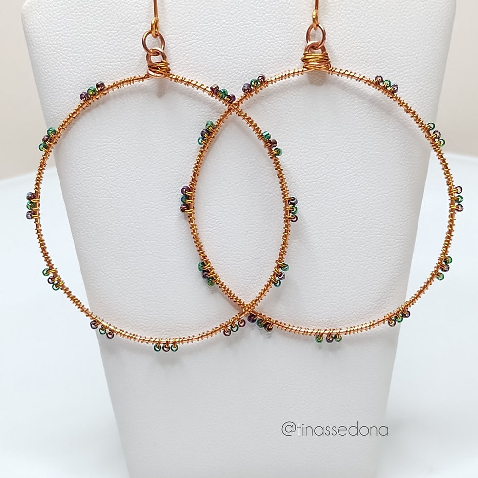 Handmade earrings of bronze with jewel tone glass