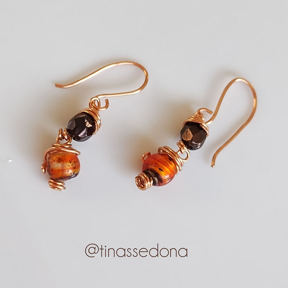 Hand beaded wire wrapped glass orange and chocolate earrings