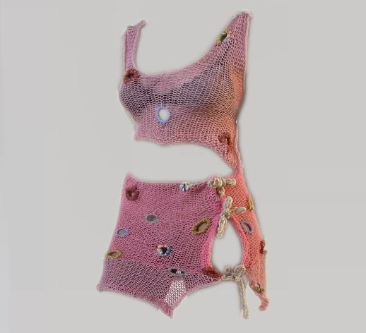 Handmade knit two-piece matching set by Melissa Knits featuring a sculptural top and skirt