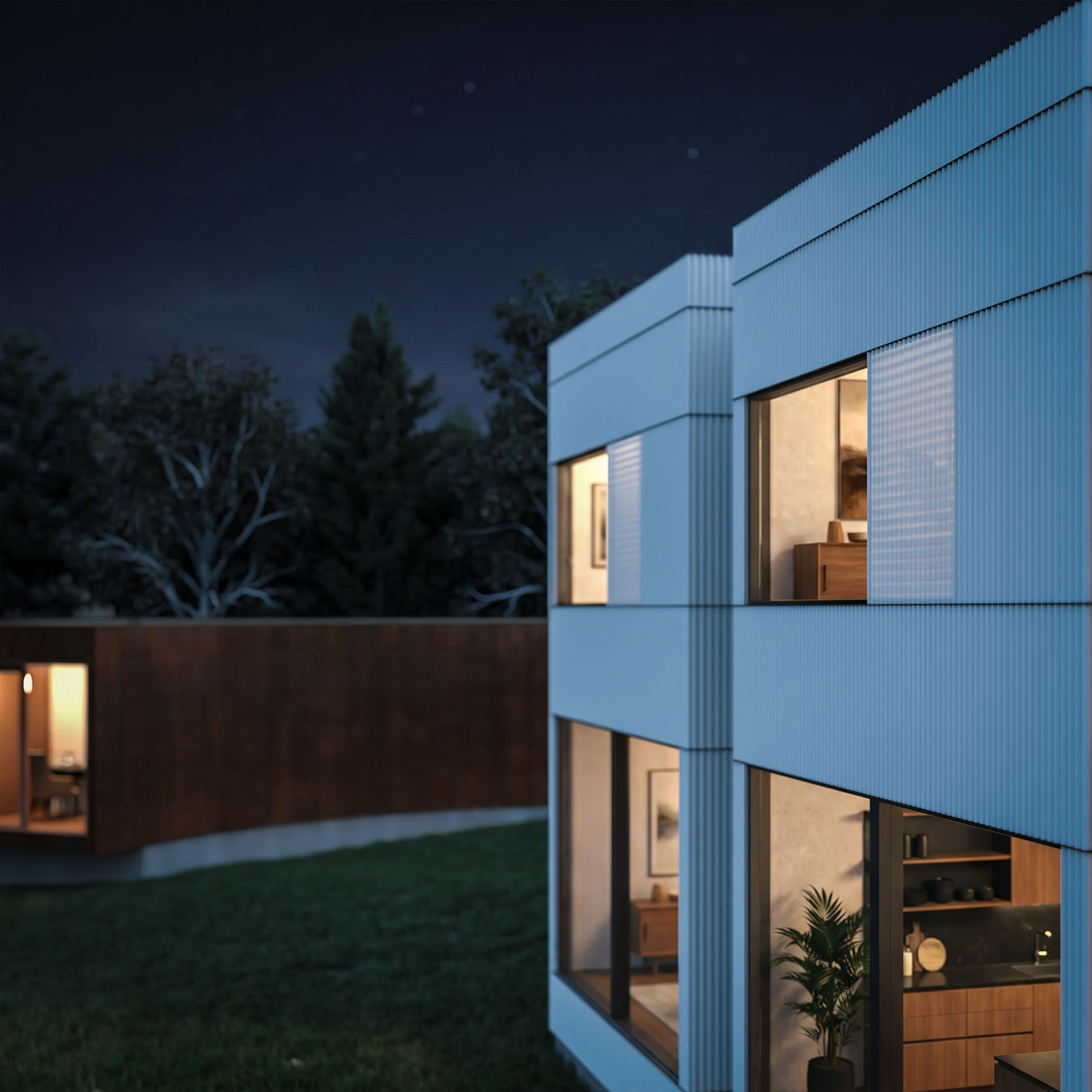 Close night view of a white ribbed facade with lit interiors, with a dark timber guesthouse volume in the background.