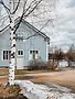 blue_house_birch_optimized.webp