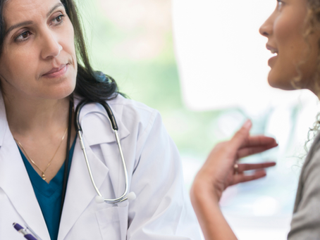 Doctor speak with a female patient