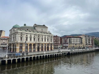 City buildings near the water in Balboa, Spain.
