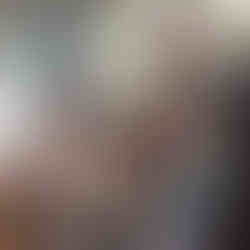 Unique handmade vest crafted from book-themed fabric, sold at McQuarrie Memorial Museum Gift Shoppe